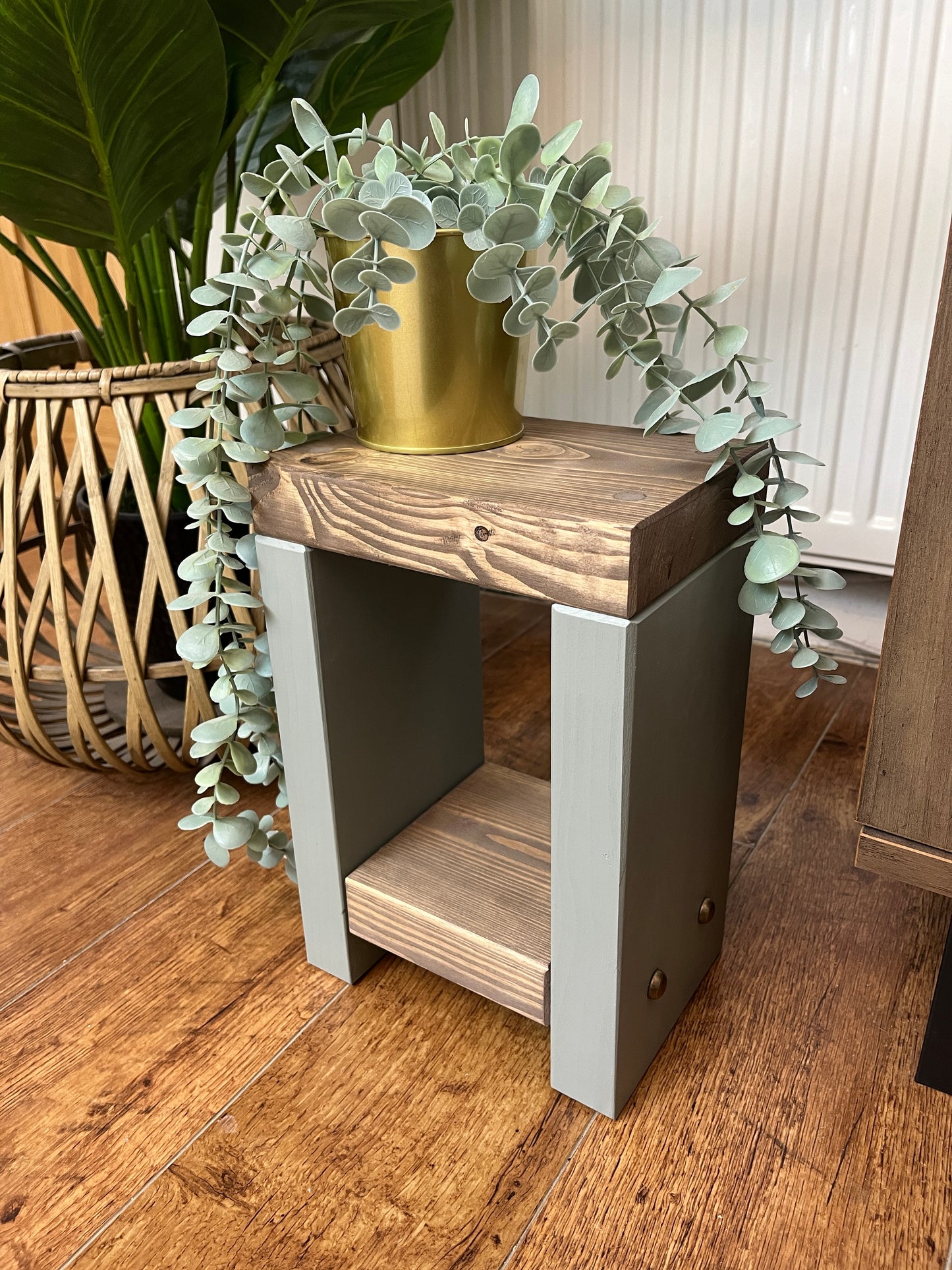 Handmade Mini Side Table crafted from handpicked timber, ideal for cozy corners or snug living areas. Features a top surface for showcasing plants or candles and a low shelf for clutter-free storage. Handmade to order with a durable finish. Customizable with two-tone effect and Farrow and Ball colors. Dimensions: H: 29.5cm, W: 20cm, D: 14cm, Height between shelf and top: 18cm