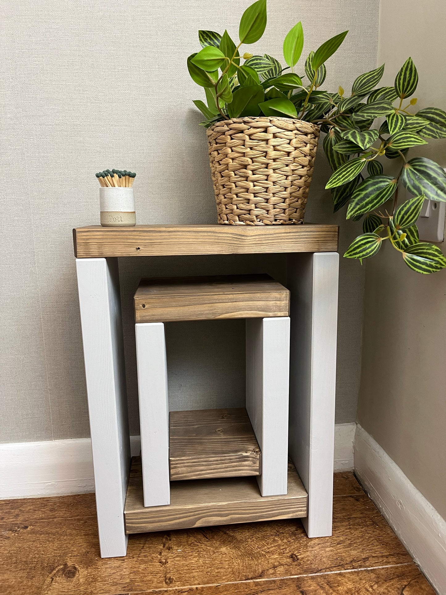 Handmade narrow nesting side table in two-tone finish. Versatile for coffee, side, or bedside use. Crafted to order with Farrow and Ball's 'Cornforth White' base and 'Jaco bean' top. Dimensions: H: 44.5cm, W: 33cm, D: 14cm. Free delivery included