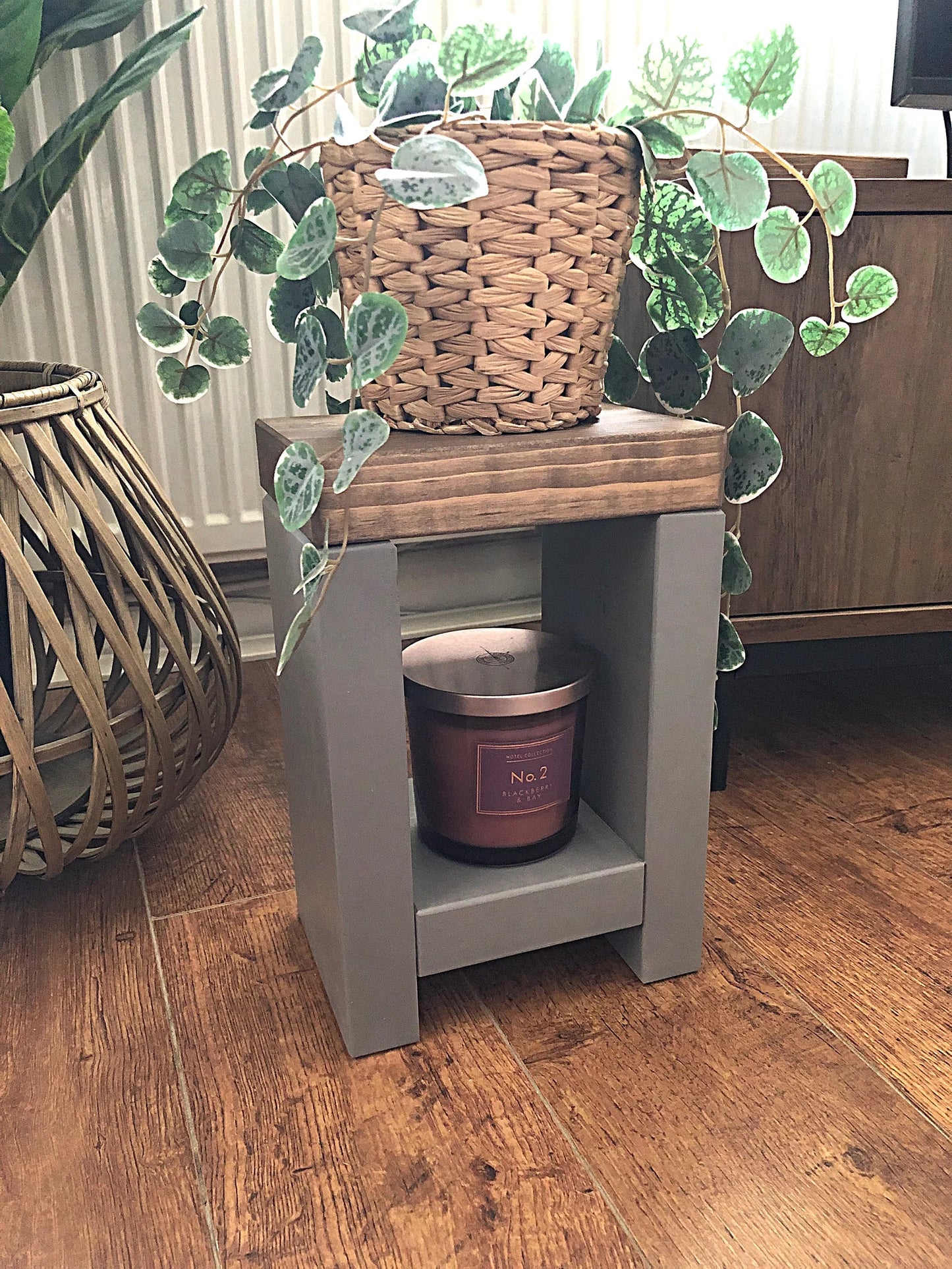 Artisan-crafted from premium timber, this small side table exudes character and elegance with its hand-applied finish in Farrow and Ball colors. Perfect for adding a bespoke touch to your decor, its carefully chosen hues enhance the table's natural beauty while seamlessly blending with any interior style. Elevate your space with this unique piece of furniture, meticulously crafted to bring warmth and sophistication to your home
