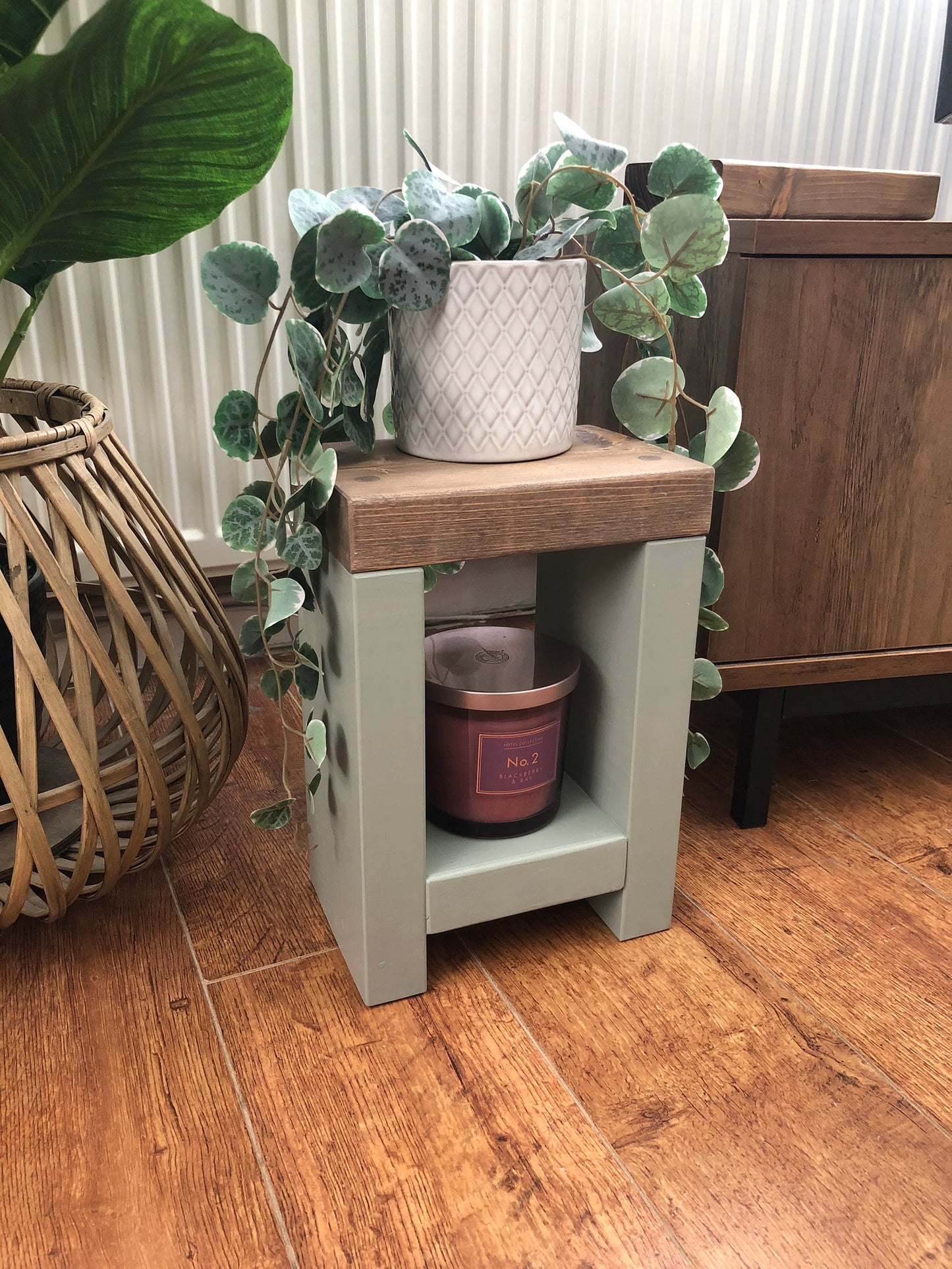 Artisan-crafted from premium timber, this small side table exudes character and elegance with its hand-applied finish in Farrow and Ball colors. Perfect for adding a bespoke touch to your decor, its carefully chosen hues enhance the table's natural beauty while seamlessly blending with any interior style. Elevate your space with this unique piece of furniture, meticulously crafted to bring warmth and sophistication to your home