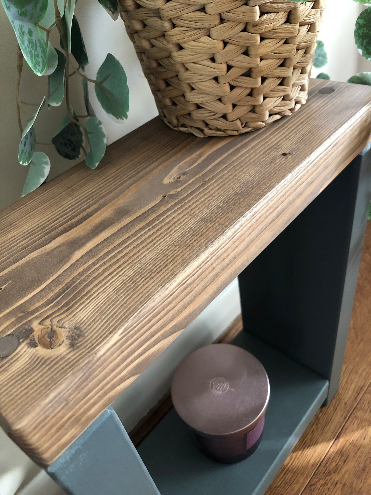 Handmade narrow side table crafted from carefully selected timber, versatile for various settings Features spacious top for plants or candles and low shelf for books or tall vase. Finished with two-tone effect: base in select Farrow and Ball colors, top in Dark Oak or Medium Oak wood dye. Dimensions: H: 44.5cm, W: 33cm, D: 14cm, with 33cm height between shelf and top. Enjoy FREE delivery on all handmade items. Order now for a carefully packaged product crafted with love. Build time: 3-4 weeks.