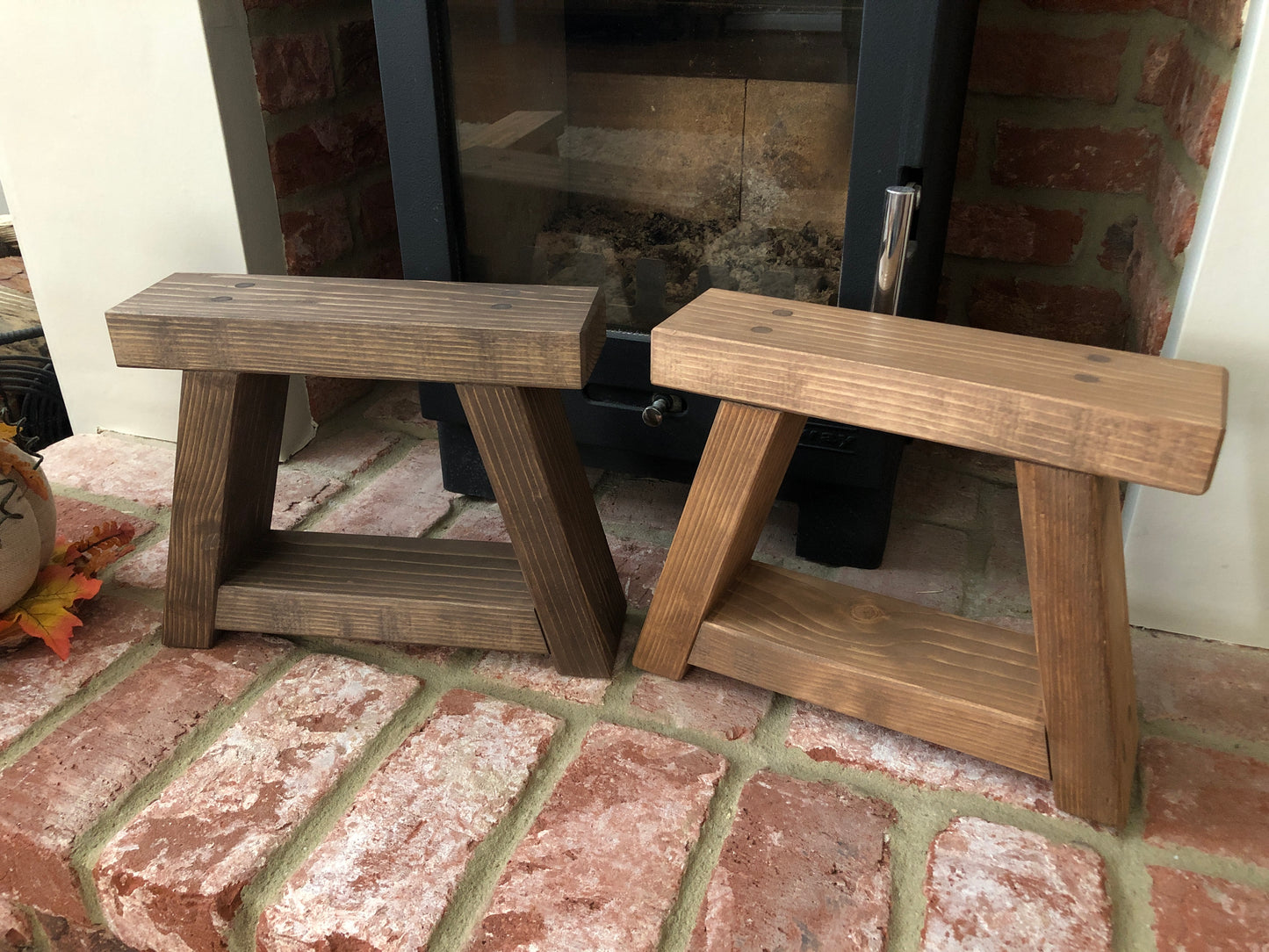 Handmade small rustic-style display stool with chunky shelves, perfect for living rooms, kitchens, and bathrooms. Ideal for house plants, beauty products, cosmetics, and candles. Made to order with options of Rustic Oak, Fir Cone, or Plain Untreated finish. Measurements: Total Height 10 inches, Width 11.75 inches, Depth 3.5 inches. Crafted with care, ensuring each piece is inspected for beauty and quality.