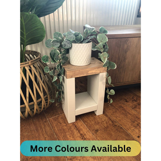 Artisan-crafted from premium timber, this small side table exudes character and elegance with its hand-applied finish in Farrow and Ball colors. Perfect for adding a bespoke touch to your decor, its carefully chosen hues enhance the table's natural beauty while seamlessly blending with any interior style. Elevate your space with this unique piece of furniture, meticulously crafted to bring warmth and sophistication to your home