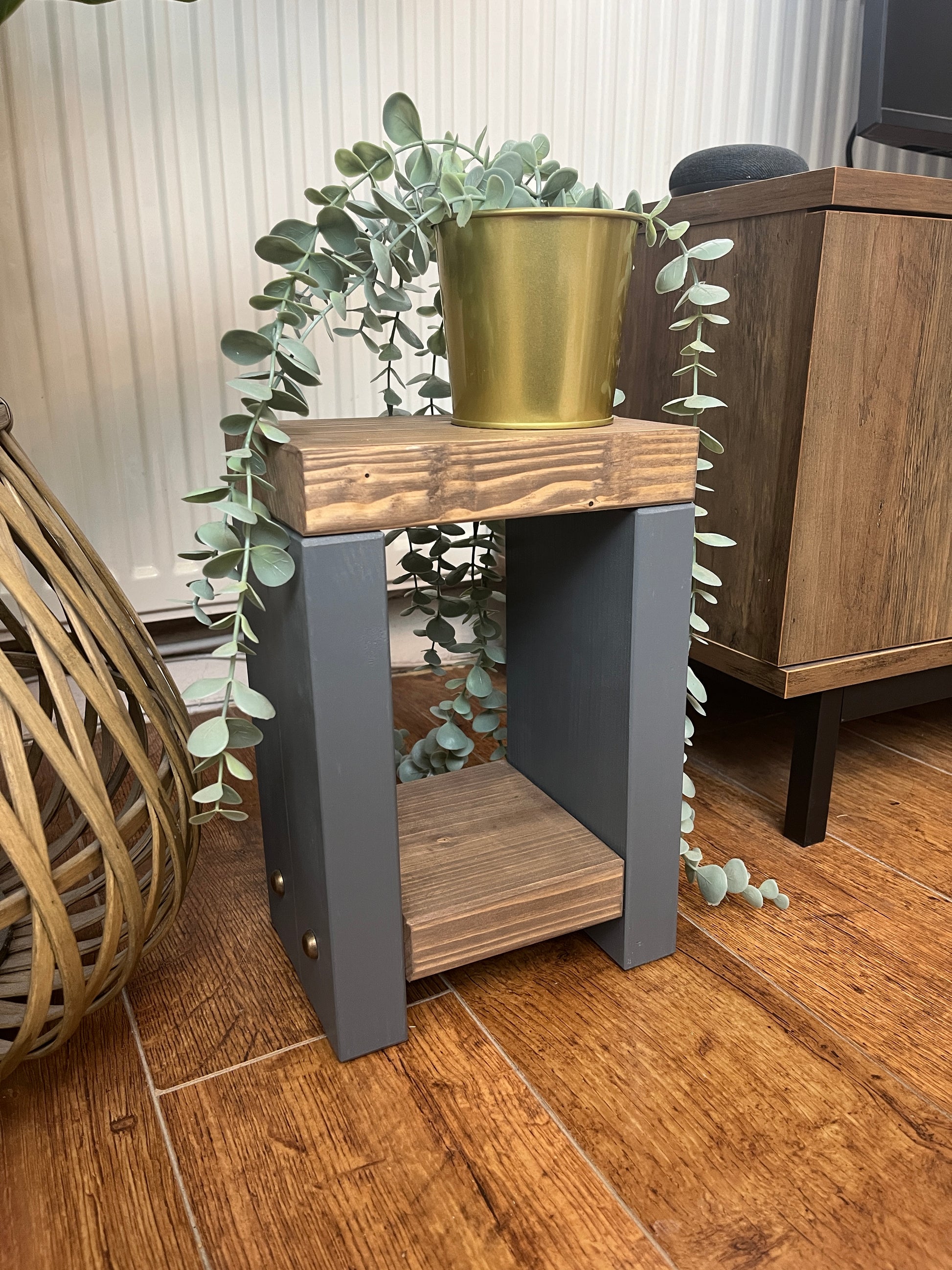 Handmade Mini Side Table crafted from handpicked timber, ideal for cozy corners or snug living areas. Features a top surface for showcasing plants or candles and a low shelf for clutter-free storage. Handmade to order with a durable finish. Customizable with two-tone effect and Farrow and Ball colors. Dimensions: H: 29.5cm, W: 20cm, D: 14cm, Height between shelf and top: 18cm