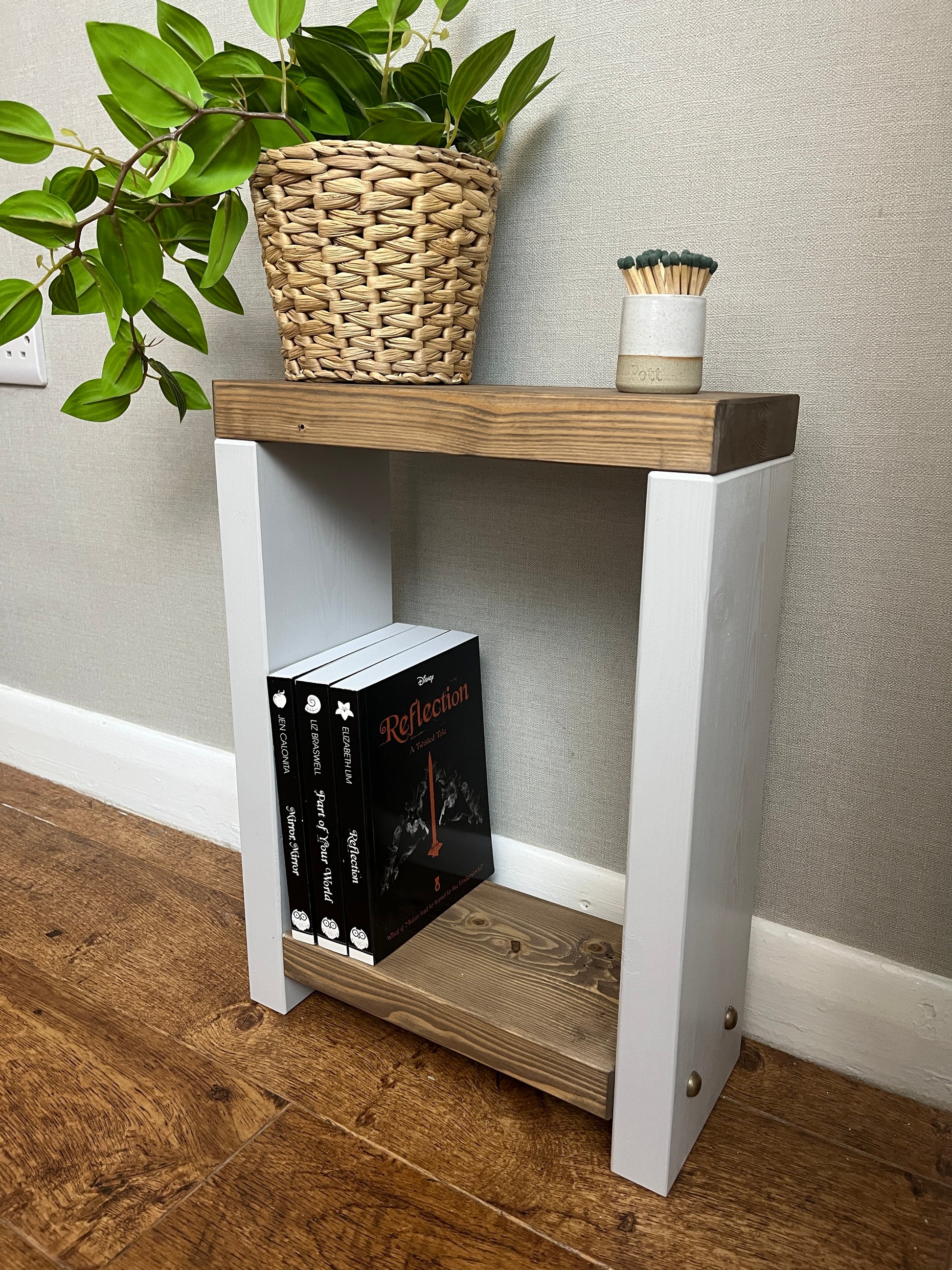 ALT Text: Premium two-tone narrow side table crafted from selected timber, versatile for various settings. Hand-sanded for quality finish. Features spacious top and low shelf for practical elegance. Select Farrow and Ball colors for base. Dimensions: H: 44.5cm, W: 33cm, D: 14cm. FREE delivery on handmade items. Built with love in our workshop in 3-4 weeks.