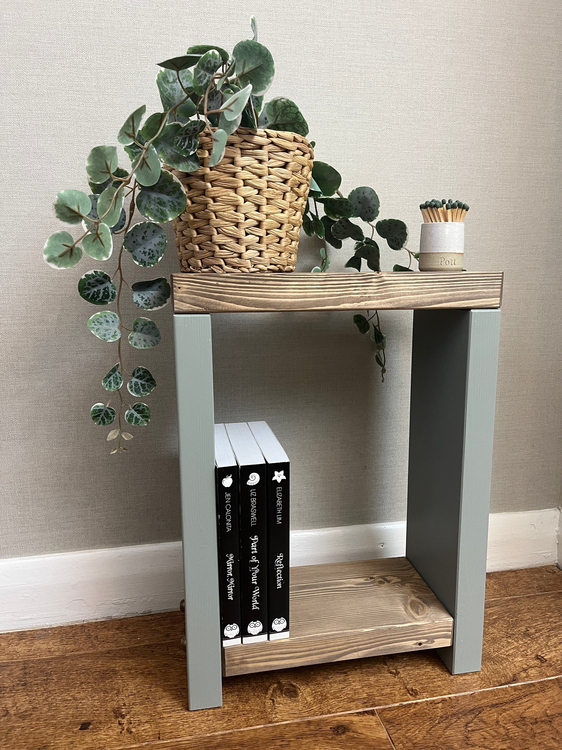 ALT Text: Premium two-tone narrow side table crafted from selected timber, versatile for various settings. Hand-sanded for quality finish. Features spacious top and low shelf for practical elegance. Select Farrow and Ball colors for base. Dimensions: H: 44.5cm, W: 33cm, D: 14cm. FREE delivery on handmade items. Built with love in our workshop in 3-4 weeks.