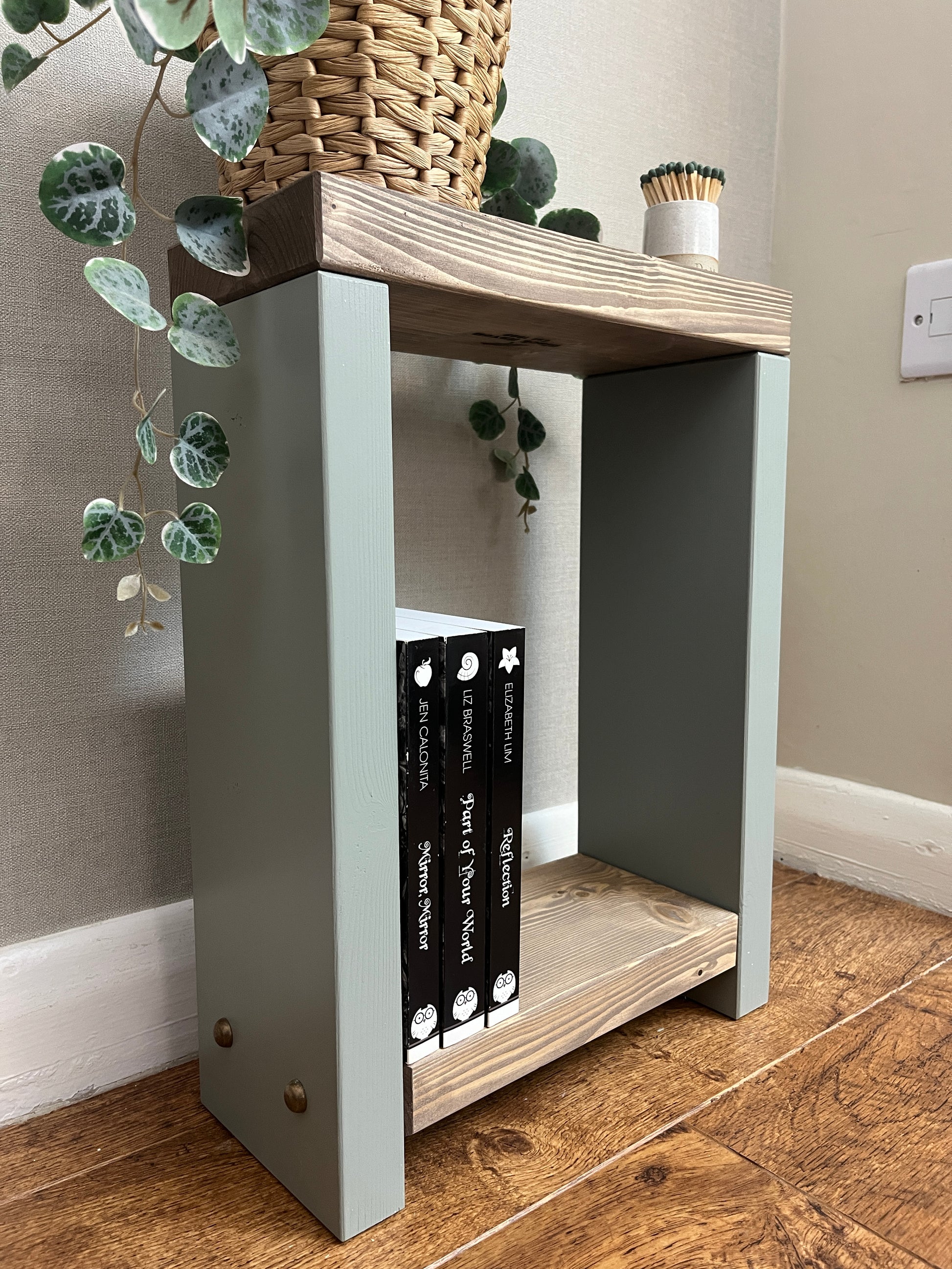 ALT Text: Premium two-tone narrow side table crafted from selected timber, versatile for various settings. Hand-sanded for quality finish. Features spacious top and low shelf for practical elegance. Select Farrow and Ball colors for base. Dimensions: H: 44.5cm, W: 33cm, D: 14cm. FREE delivery on handmade items. Built with love in our workshop in 3-4 weeks.