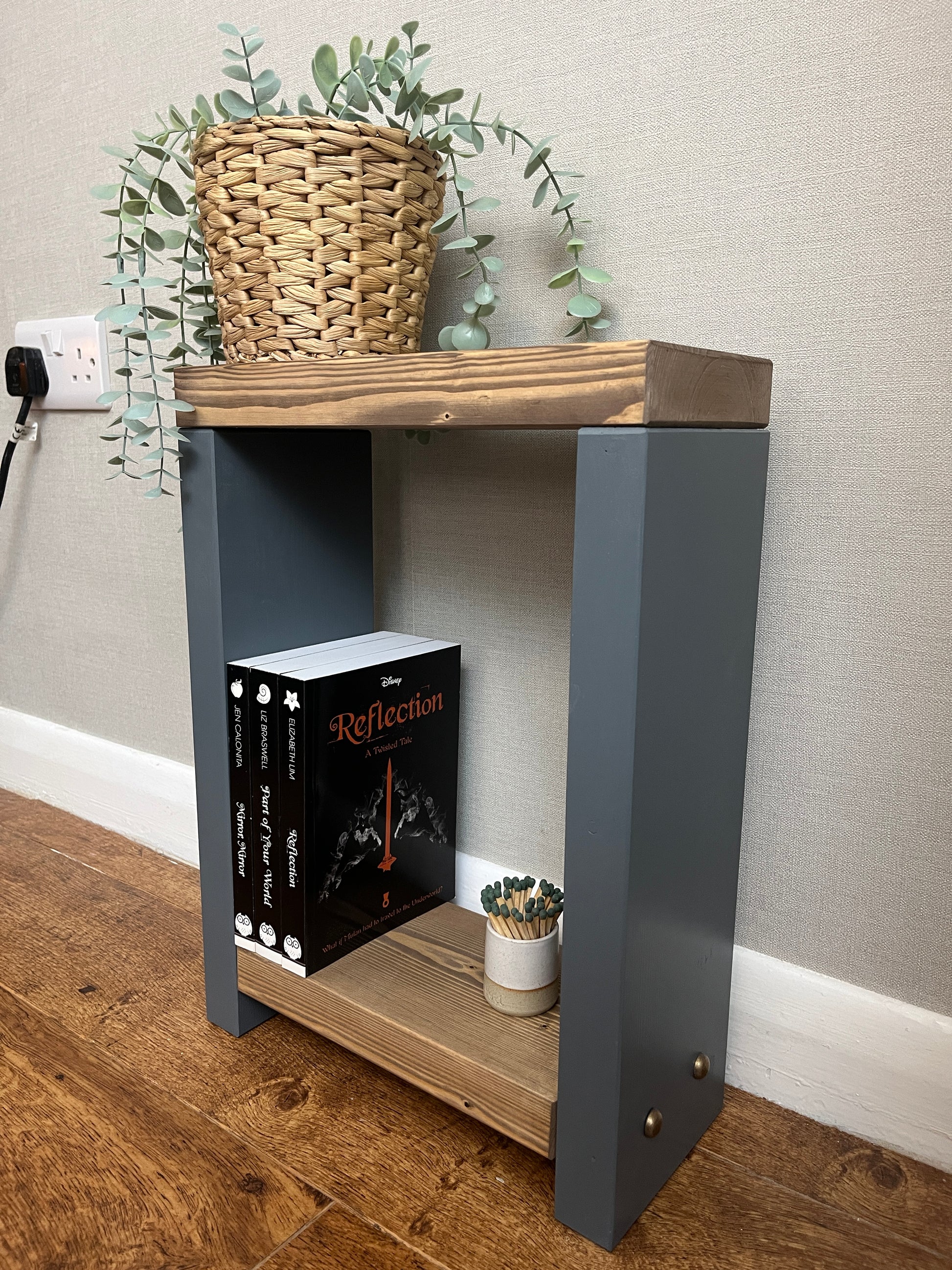 ALT Text: Premium two-tone narrow side table crafted from selected timber, versatile for various settings. Hand-sanded for quality finish. Features spacious top and low shelf for practical elegance. Select Farrow and Ball colors for base. Dimensions: H: 44.5cm, W: 33cm, D: 14cm. FREE delivery on handmade items. Built with love in our workshop in 3-4 weeks.
