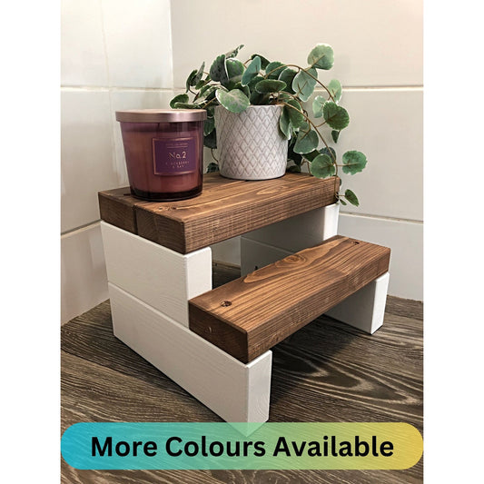Handmade 2-tier wooden step stool, ideal for reaching high places in any room. Crafted from Scandinavian Pine with a two-tone finish. Base available in select Farrow and Ball colors. Dimensions: W: 30cm, H: 21cm, D: 26cm. Other colour options include Fresh Pine. Variations in grain and colour may occur due to the unique nature of each piece of wood