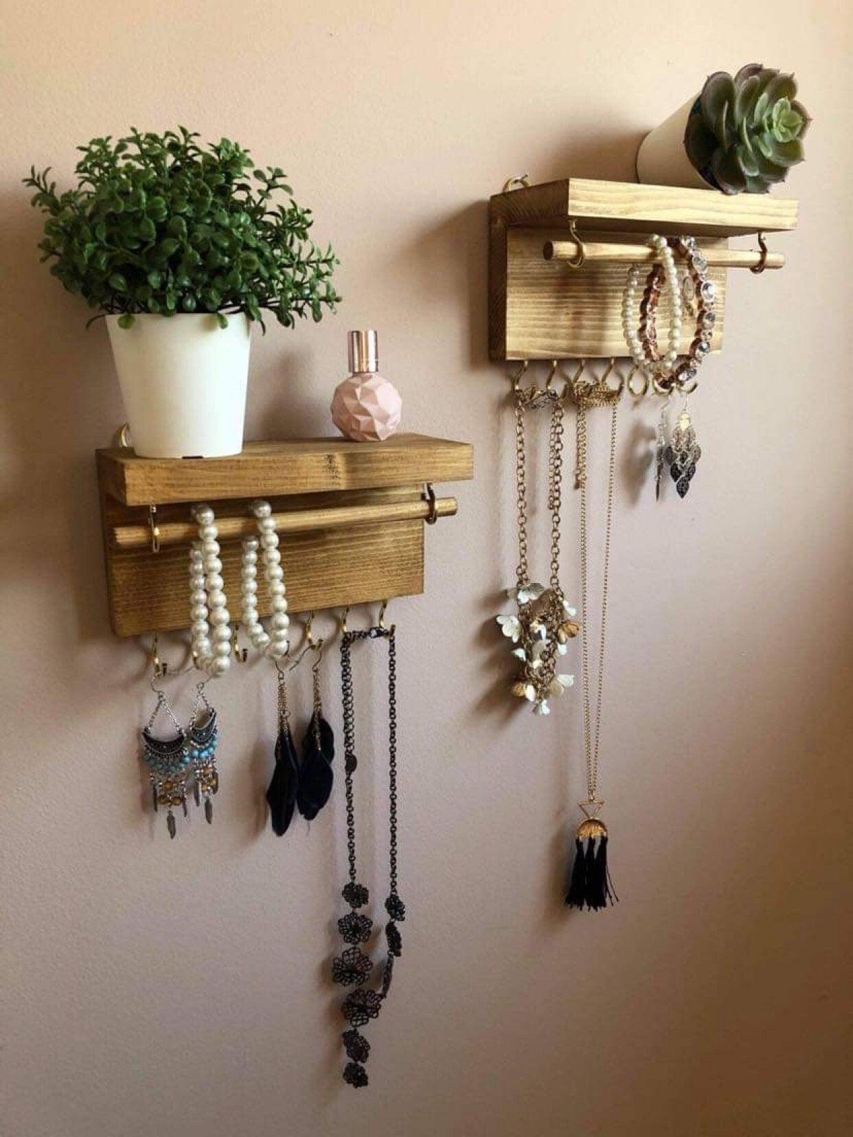 Handmade wooden jewellery organizers and earring displays in various finishes including Rustic Oak and Ebony. Each organizer features 7 brass hooks for ample storage. Perfect for showcasing necklaces, bracelets, and earrings. Customize with brass or upgrade to silver/chrome hooks and D rings