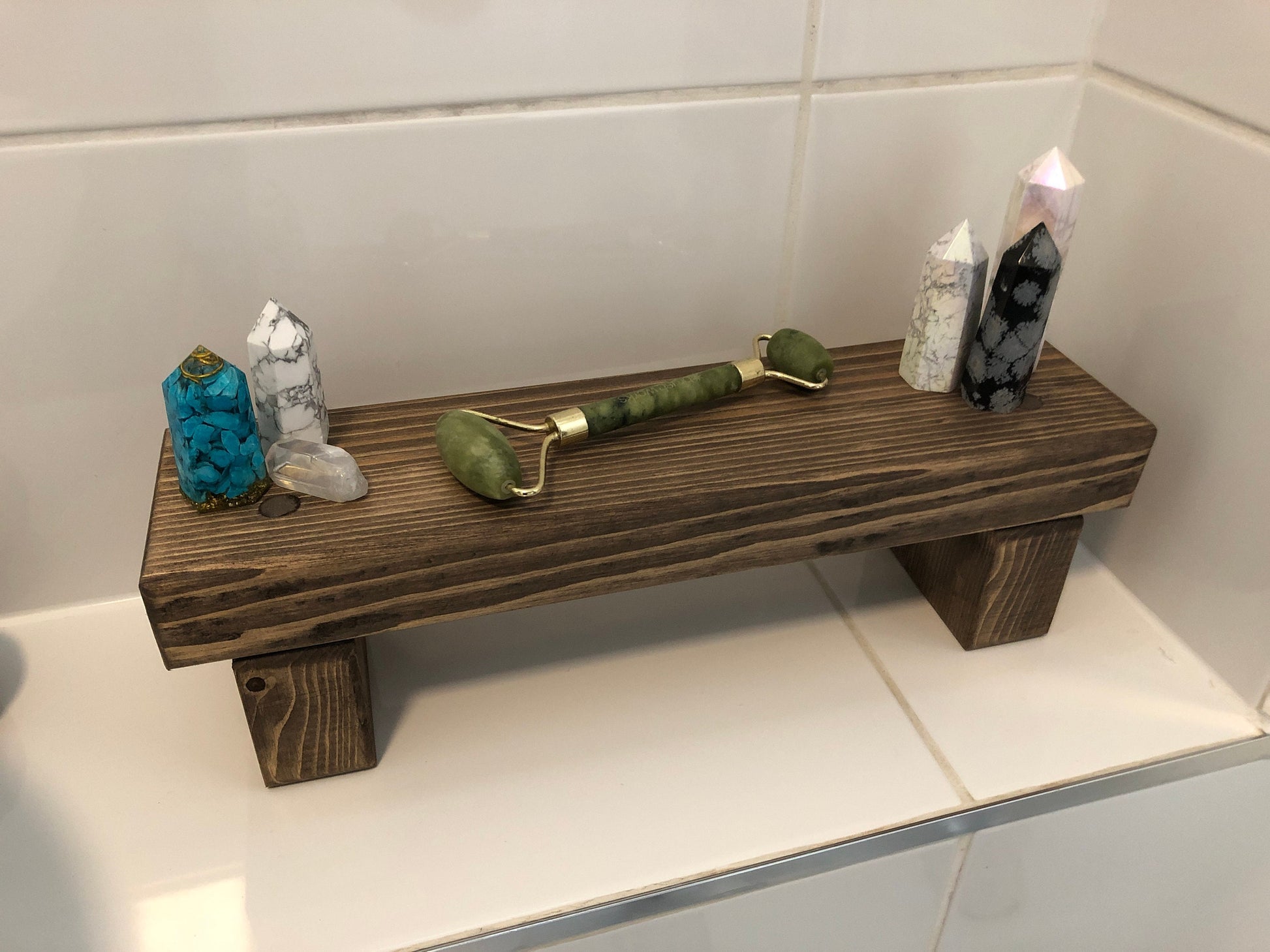 "Simple riser shelf handmade from rustic timber, perfect for any room. Ideal for windowsills, dressing tables, kitchen worktops, or bathrooms. Available in Woodland, Autumn Leaves, Fir Cone, Rustic Oak, Fresh Pine, Farmhouse Pine, Ebony. Custom sizes: Small, Medium, Large. Dimensions: Large - Length 450mm, Width 89mm, Height 99mm."