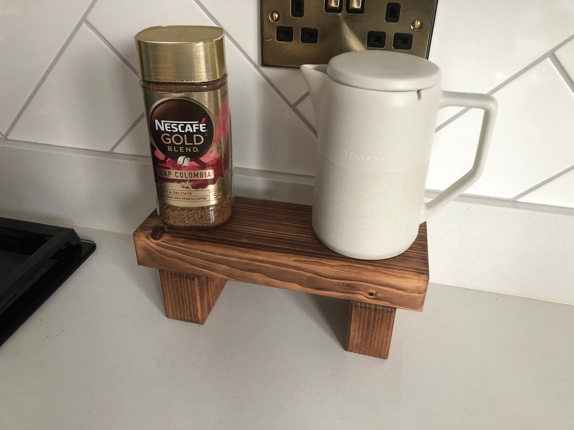 "Simple riser shelf handmade from rustic timber, perfect for any room. Ideal for windowsills, dressing tables, kitchen worktops, or bathrooms. Available in Woodland, Autumn Leaves, Fir Cone, Rustic Oak, Fresh Pine, Farmhouse Pine, Ebony. Custom sizes: Small, Medium, Large. Dimensions: Large - Length 450mm, Width 89mm, Height 99mm."